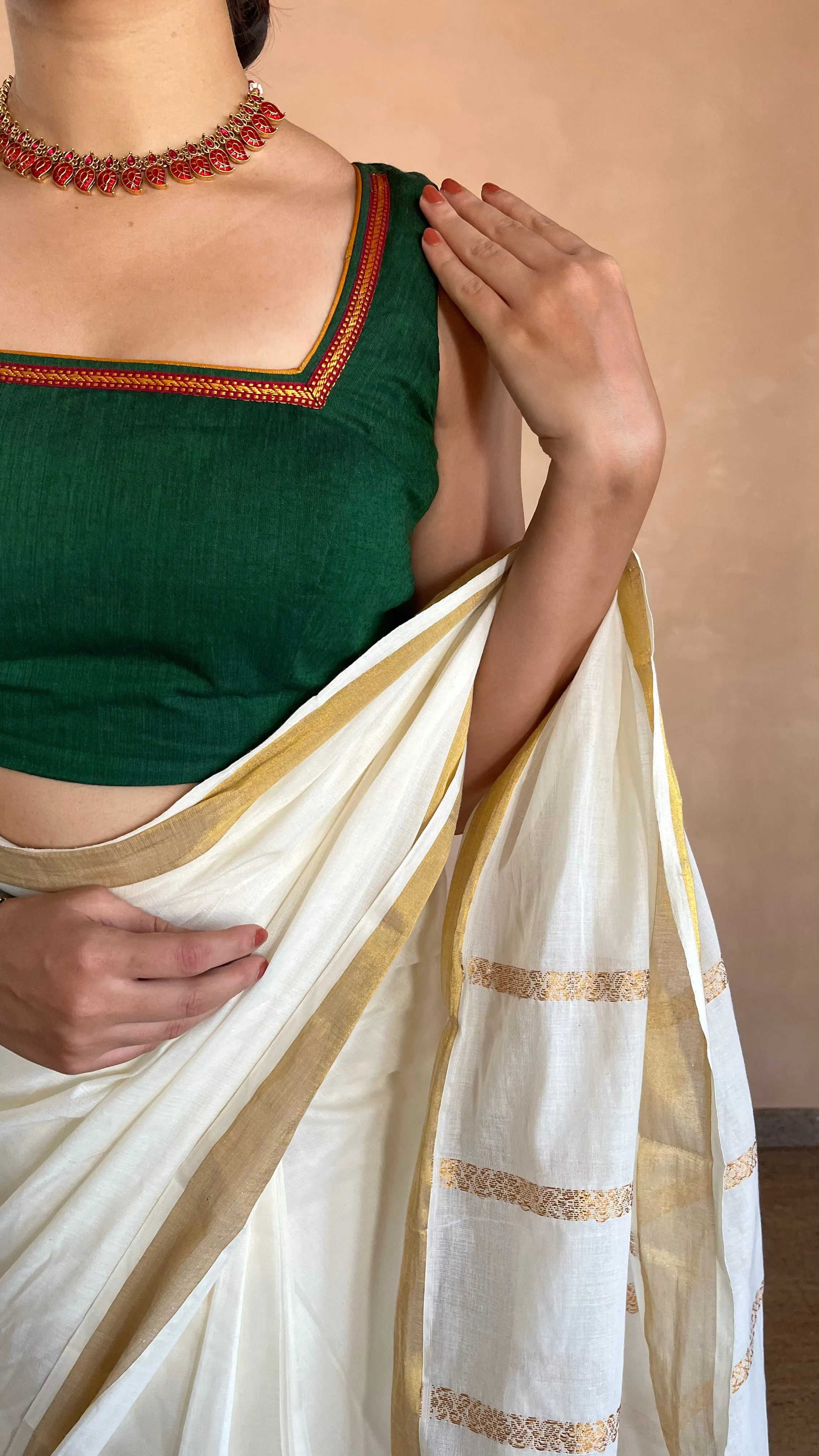 Amala x Tyohaar | Bottle Green Mangalgiri 100% Cotton Sleeveless Saree Blouse with Zari Border Detailing