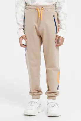 Boys Beige Zip Pocket With Print Jog Pants